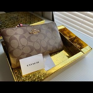 Brand new Coach Large Wristlet